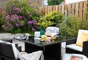 The patio at the rear of the house is perfect for al fresco dining.