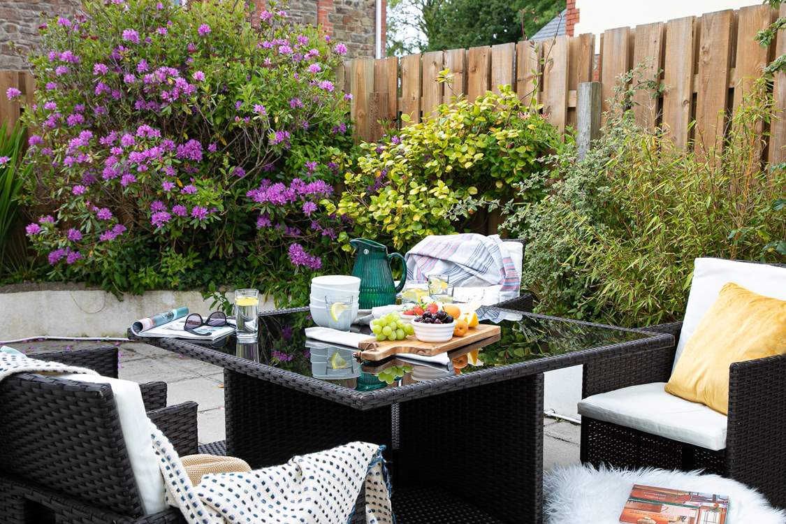 The patio at the rear of the house is perfect for al fresco dining.