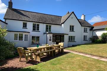 Enjoy the Devonshire sunshine on the wonderful lawn.