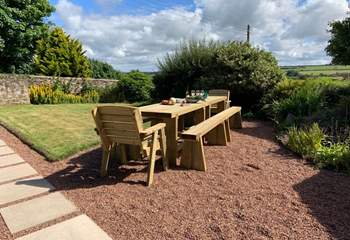 Enjoy the sunshine on the newly added wooden dining area.