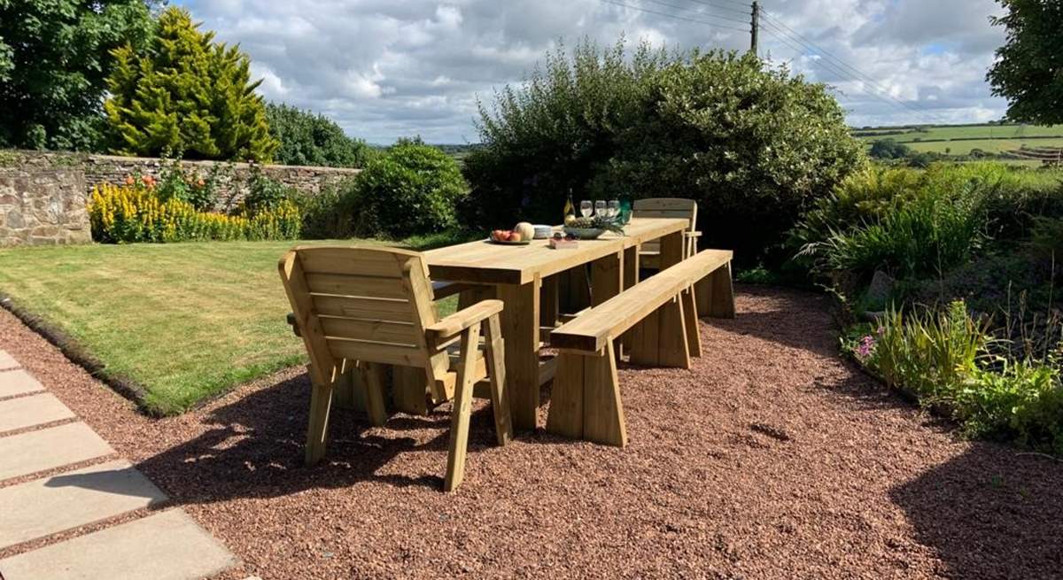 Enjoy the sunshine on the newly added wooden dining area.