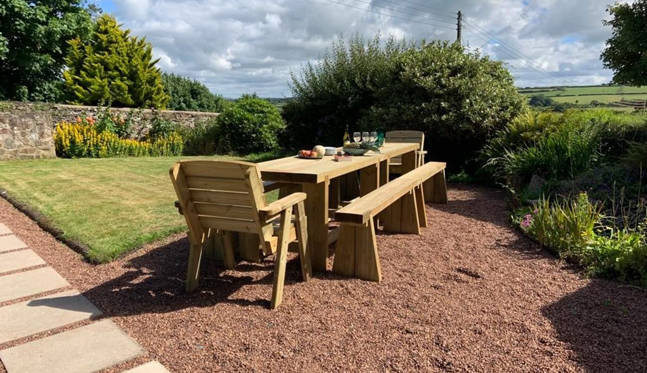 Enjoy the sunshine on the newly added wooden dining area.