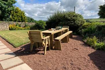 Enjoy the sunshine on the newly added wooden dining area.