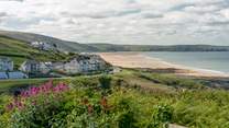 Enjoy the sand dunes at Woolacombe, a former Britain's best beach winner.
