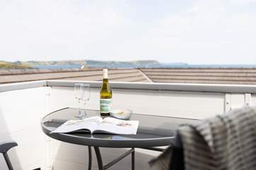 A door from the kitchen leads to the balcony where you can sit and enjoy the view from dawn until dusk.
