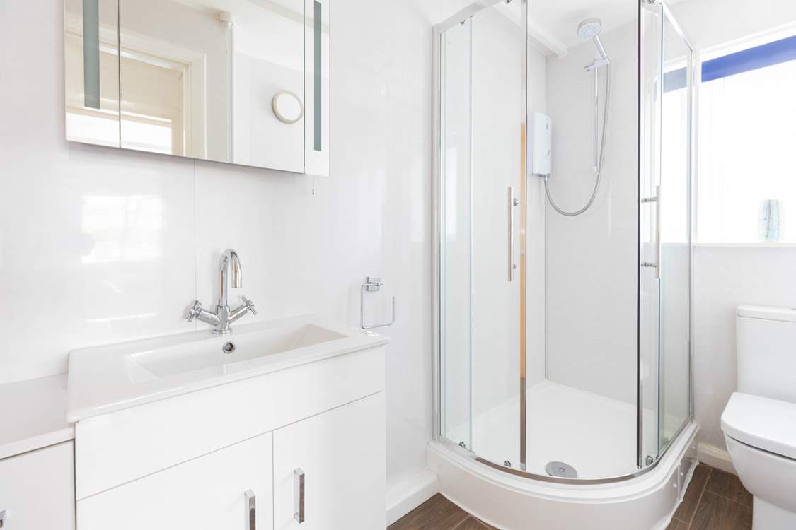 The shower-room is perfect for rinsing salty toes after a beach day.