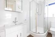 The shower-room is perfect for rinsing salty toes after a beach day.