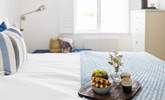 The bedroom is light and bright with a super-king size bed for a great night's sleep. - Thumbnail Image