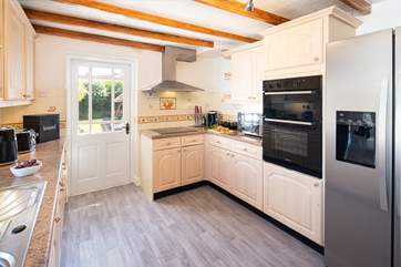 You'll find an electric oven and hob, microwave, fridge/freezer and dishwasher.