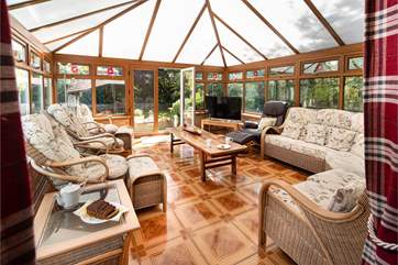 Relax and unwind in the fabulous conservatory.