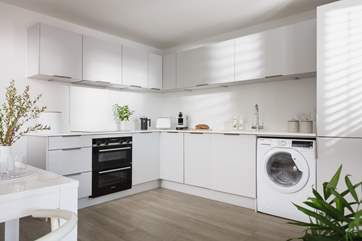 The stylish kitchen is ideal for rustling up a feast.