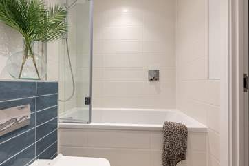 Enjoy a soak in the bath tub.