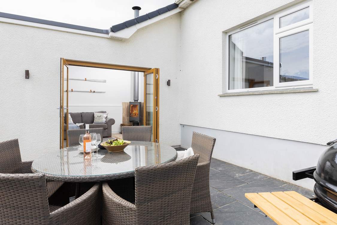 Doors lead out from the snug onto the secluded patio where you can sit in the Cornish sunshine and dine al fresco.