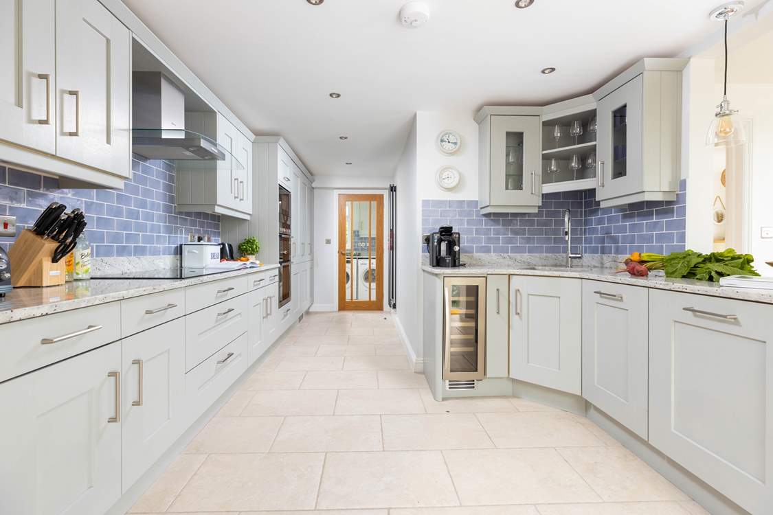 The spacious kitchen has everything you will need.