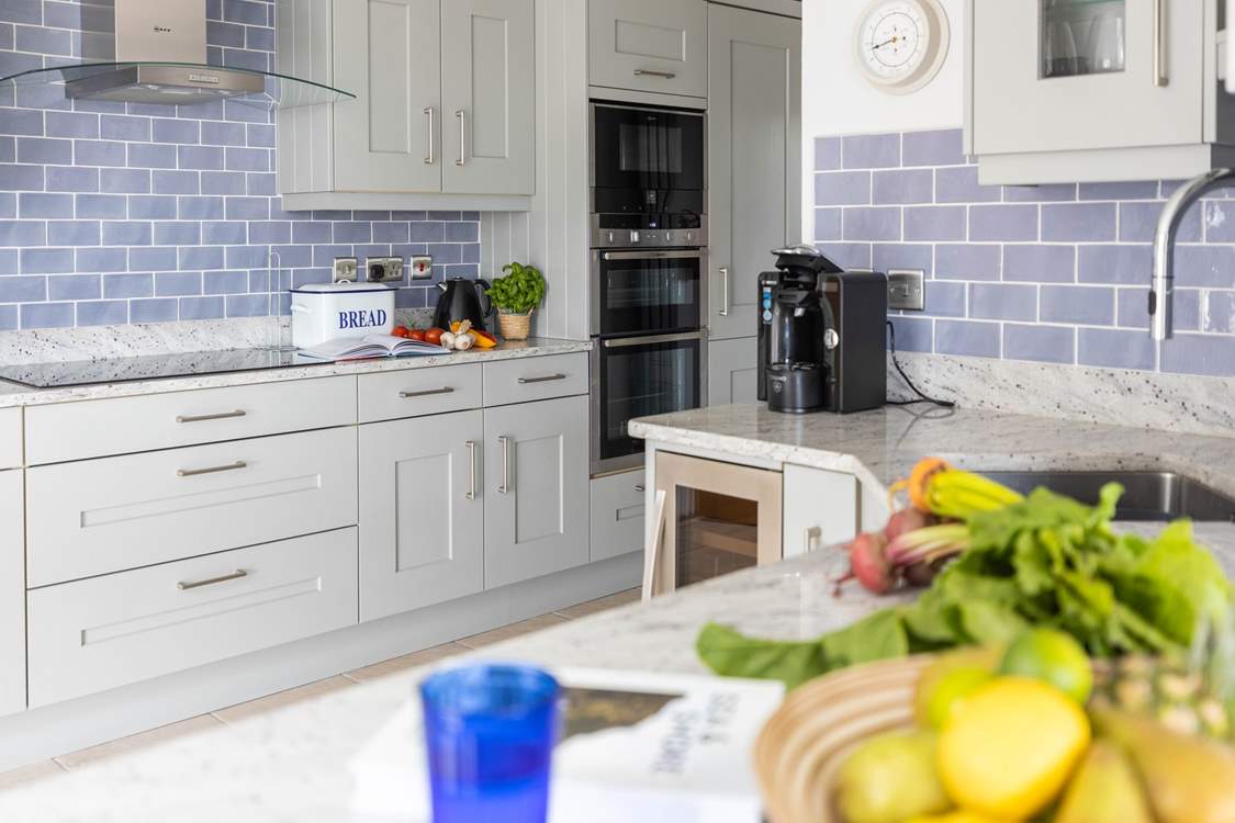The beautifully crafted kitchen is a delight.