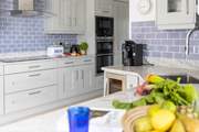 The beautifully crafted kitchen is a delight.