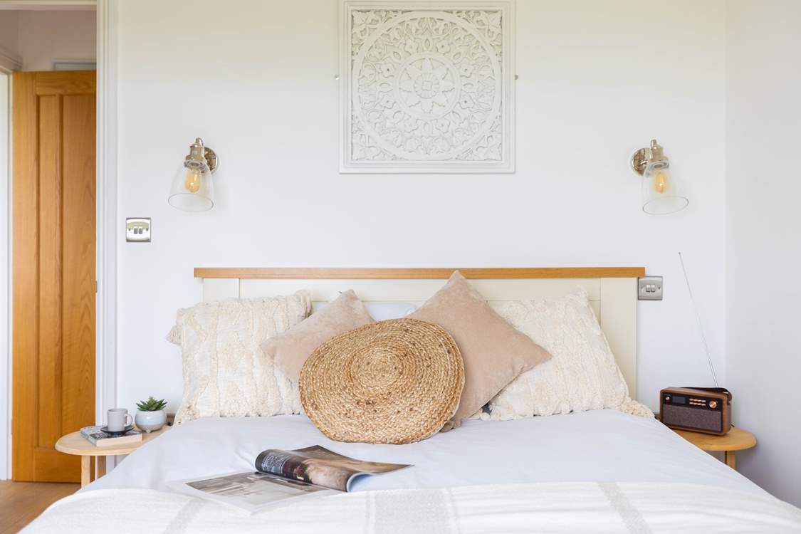A great night's sleep is assured in this lovely bedroom.