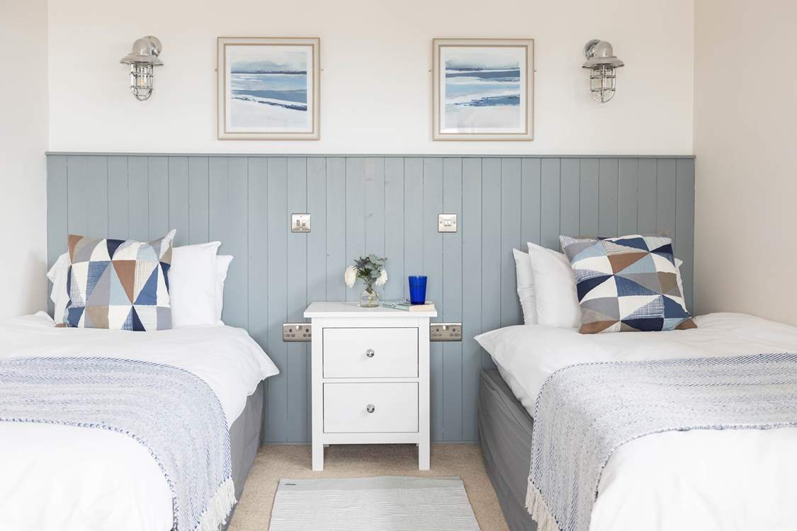Pretty bedrooms await.