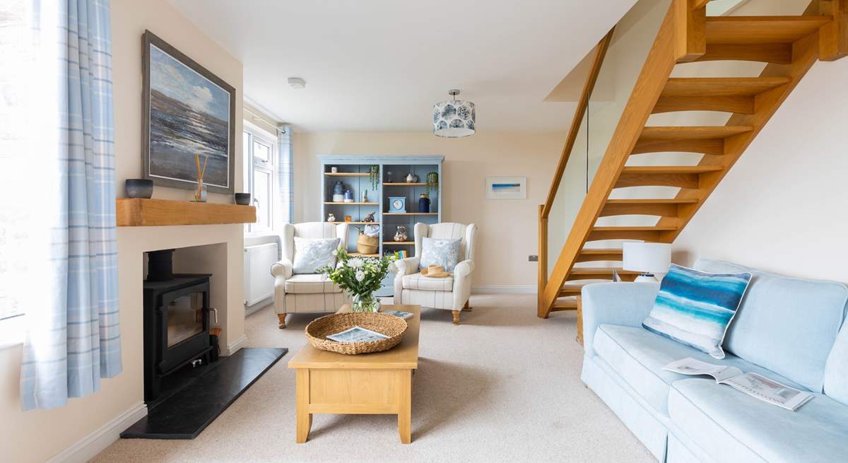 The sitting-room has nautical touches giving a nod to the seaside location and a wood-burner to keep you cosy throughout the year.