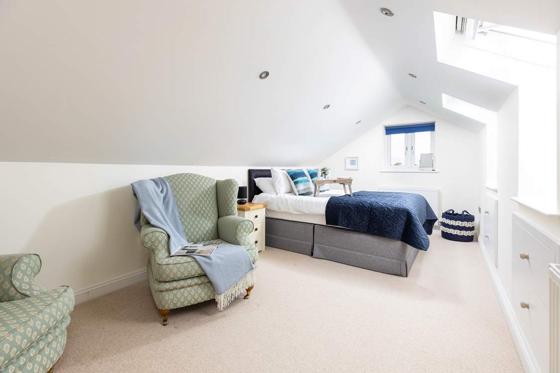 Bedroom 3 is on the first floor with a comfy king-size bed and views towards the sea.