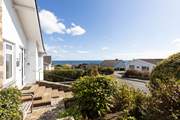 There are seven steps from the drive to the front door of Willow's Place or guests can use the alternative path to the property.