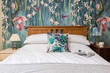 What a colourful double room (Bedroom 2).