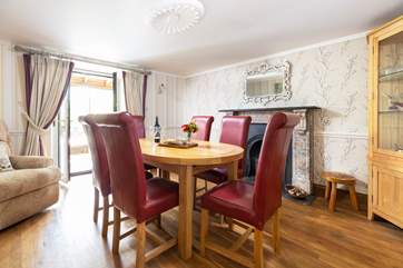The spacious dining-room can be accessed through the conservatory.