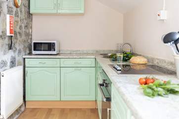 There is everything you might need in this well-equipped kitchen.