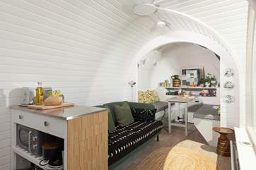The gorgeous open-plan living area greets you as you enter.