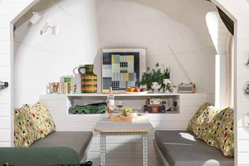 The picturesque dining-area is lovely for two. This can also be turned into a double bed for children upon request.