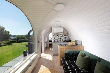 Open plan living and panoramic views from the impressive windows.