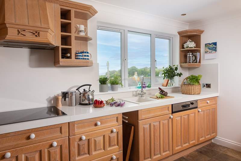 The kitchen has all the equipment you will need to create a holiday meal, although the view towards the harbour may be a little distracting!