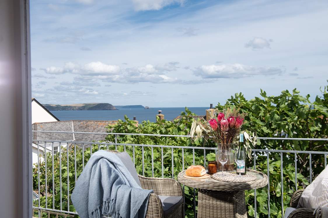 With views towards distant headlands, the front balcony is a blissful place to sit.