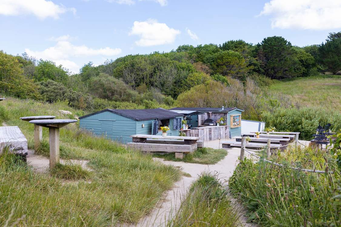 The Hidden Hut can be found just a gentle stroll away along the coast path overlooking Porthcurnick beach.