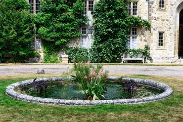 Parham house is set at the foot of the South Downs National Park. It remains a beautiful Elizabethan family home.