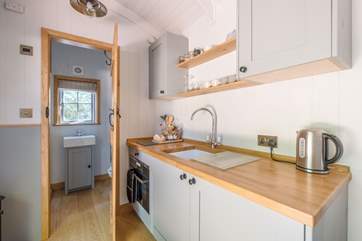 The kitchen is well-equipped with everything you'll need.
