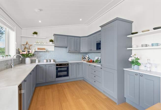 The super sleek kitchen has all the equipment you'll need.