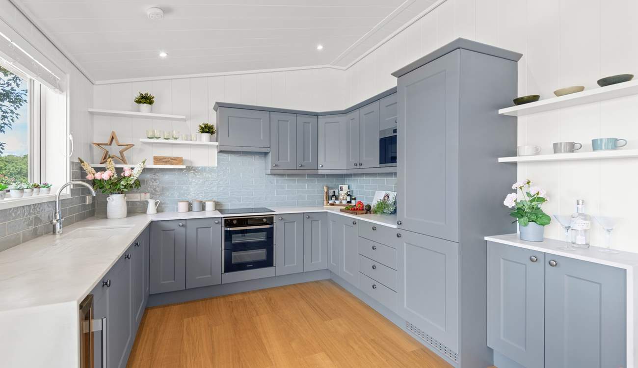 The super sleek kitchen has all the equipment you'll need.