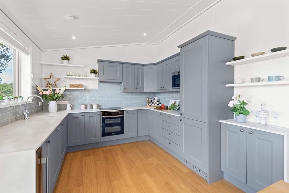 The super sleek kitchen has all the equipment you'll need.