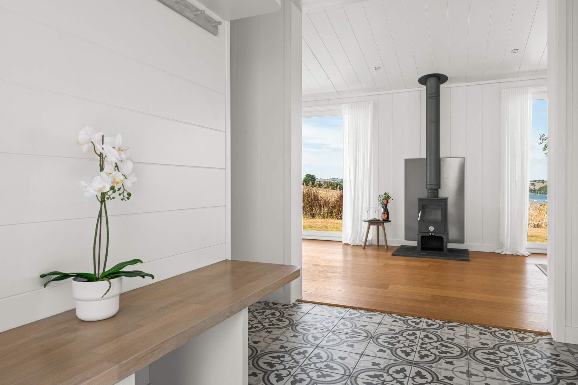 The wood-burner will warm your toes throughout the year.