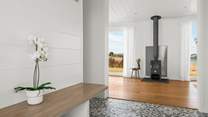 The wood-burner will warm your toes throughout the year.