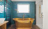 The en suite Bathroom has this fabulous roll-top bath and a stunning rainfall shower. - Thumbnail Image