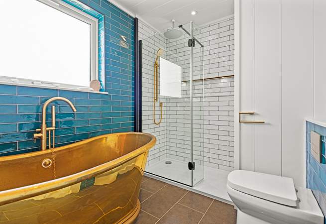 The dreamy bathtub is perfect for a blissful soak. 