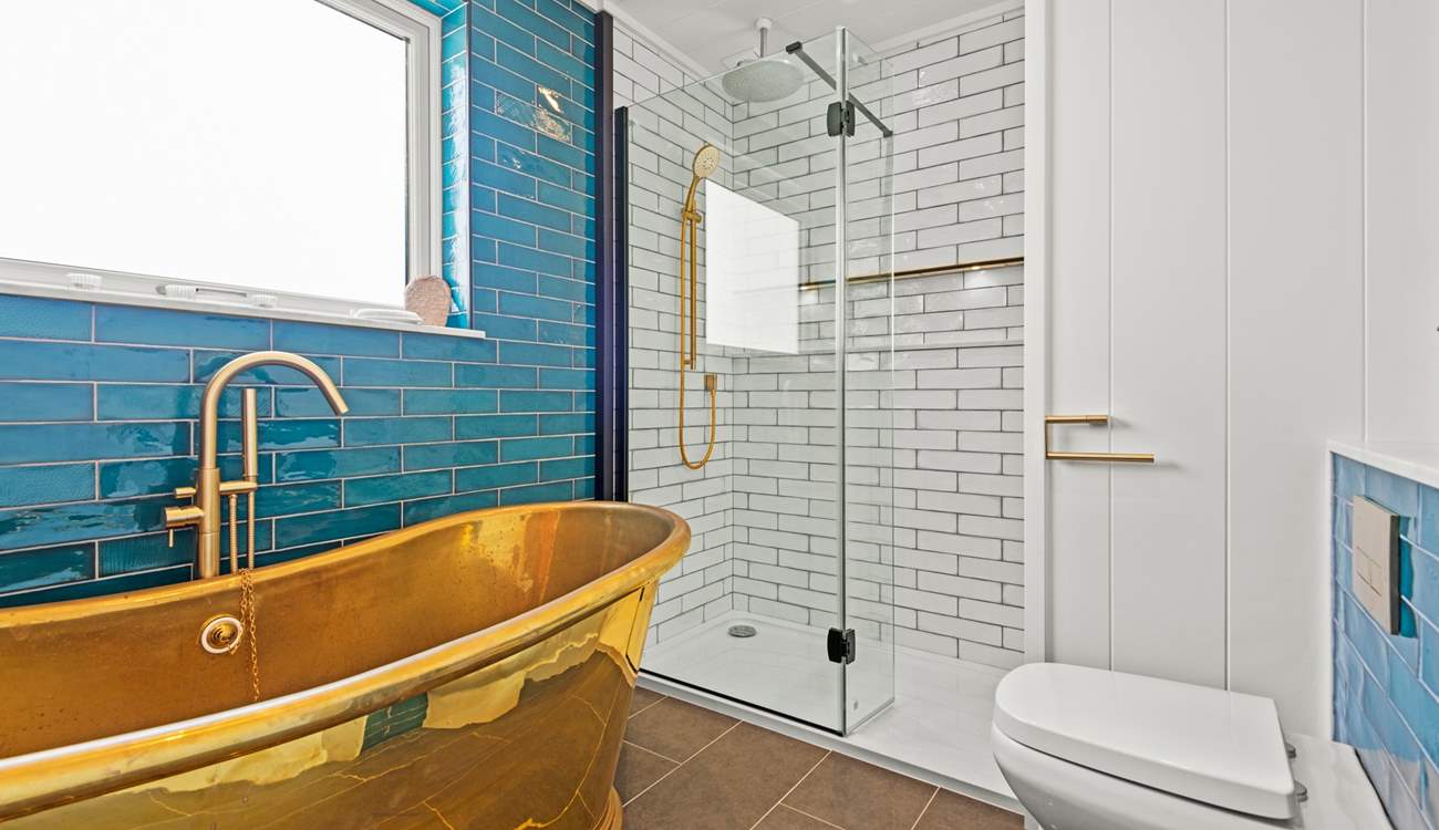 The dreamy bathtub is perfect for a blissful soak. 