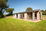 Greenway Hideaway has a huge grassed lawn for the children and family dog to let off steam.