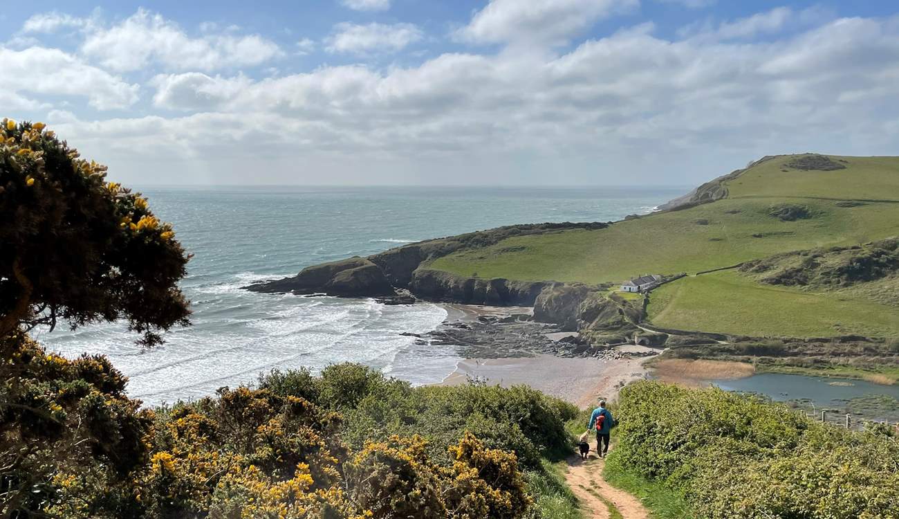 You can wander down to the magical beach of Mansands via the coastal path.