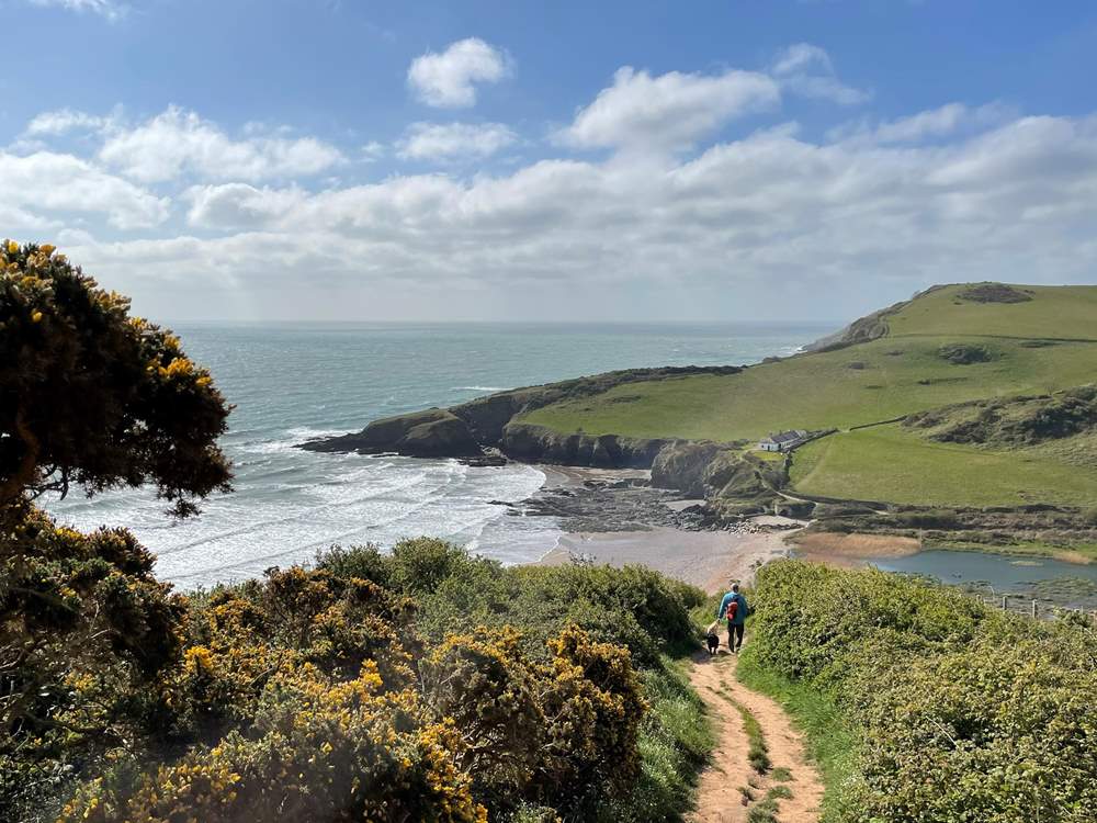 You can wander down to the magical beach of Mansands via the coastal path.