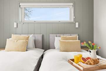 Lovely linens and comfy beds await.