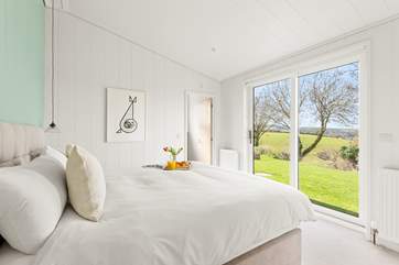 The bedrooms are decorated in muted tones for a restful night.