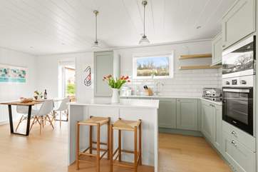 The stylish kitchen has all the equipment you'll need to cook a holiday meal.